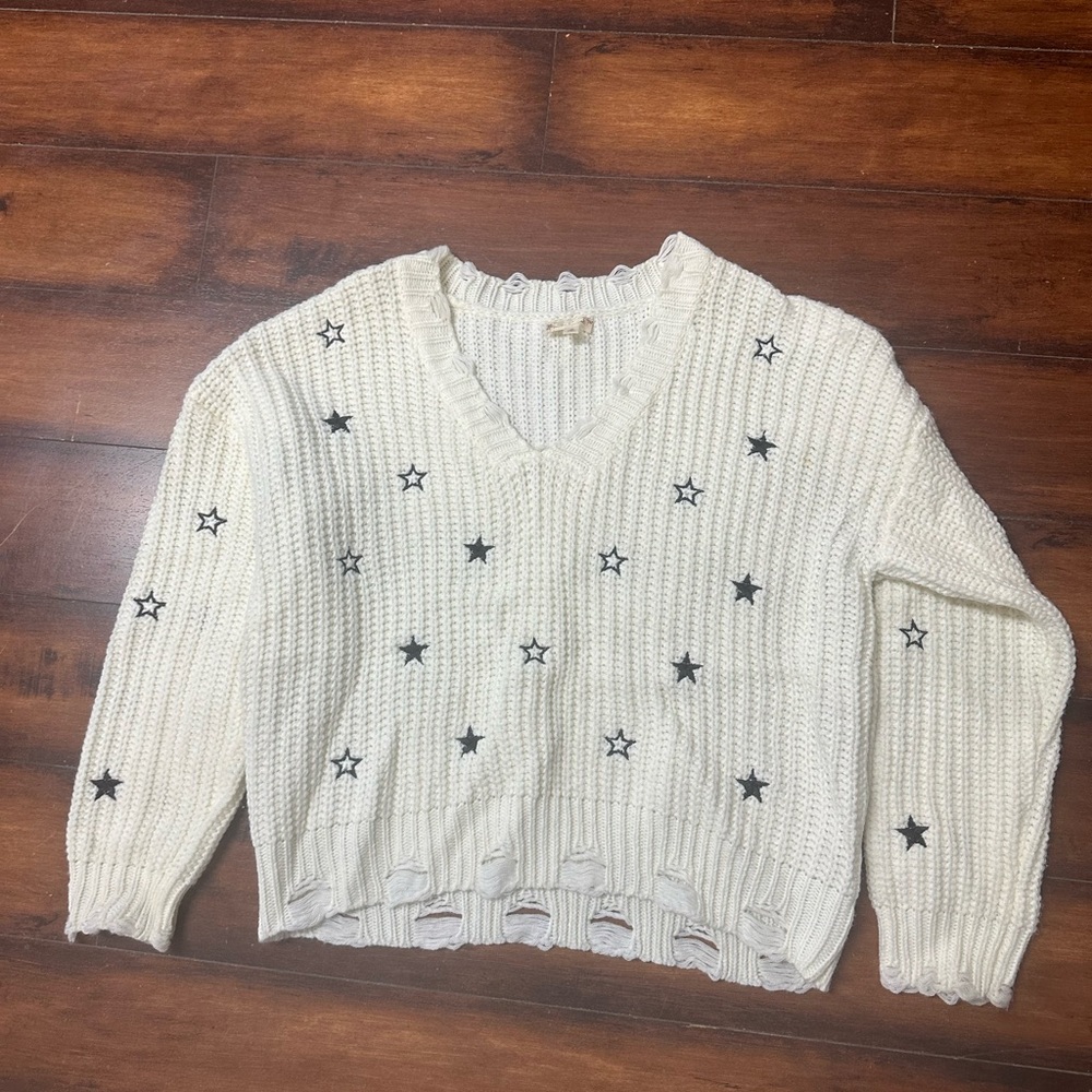 Hem & Thread Cream V-Neck Sweater with Black Stars